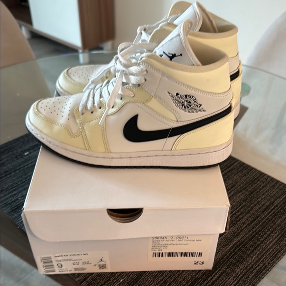 Nike Air Jordan 1 Mid Coconut Milk and Black Sneakers